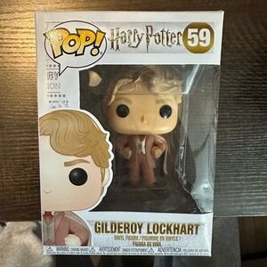 Pop Gilderoy Lockhart Vinyl Figure - Blonde and Black